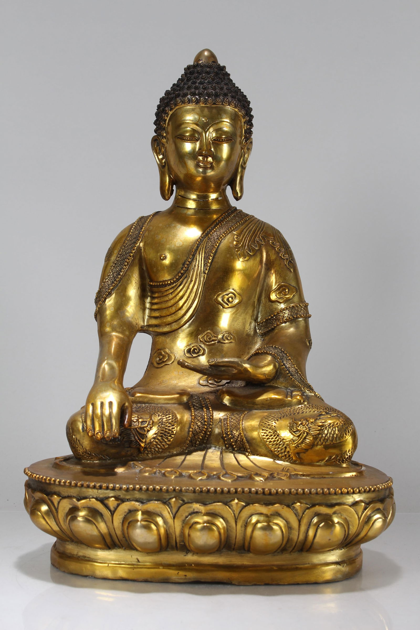 A CHINESE RELIGIOUS MASSIVE GILT