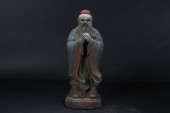 A CHINESE RELIGIOUS PONDERING-