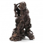 A CHINESE ROOTWOOD SCULPTURE O