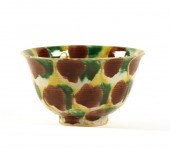 A CHINESE SANCAI GLAZED PORCEL