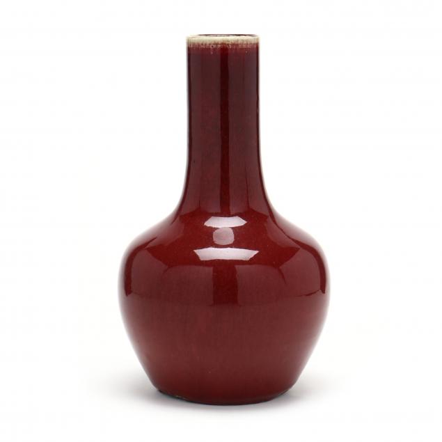 A CHINESE SANG DE BOEUF VASE 
