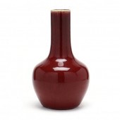 A CHINESE SANG DE BOEUF VASE