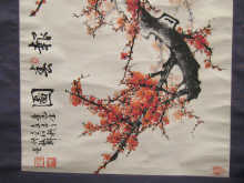 A Chinese scroll painting of prunus