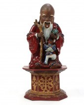 A CHINESE SHIWAN CLAY AND ENAM