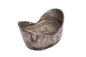 A CHINESE SILVER INGOT<br>Dime