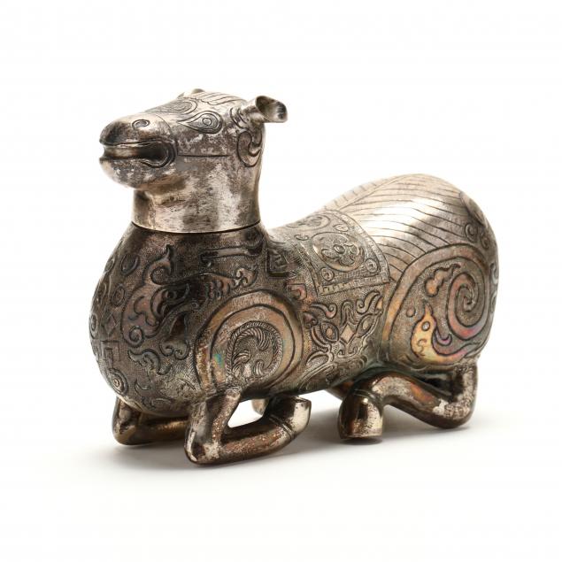 A CHINESE SILVER ZOOMORPHIC BOX  An