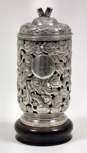 A Chinese silvery metal cylind