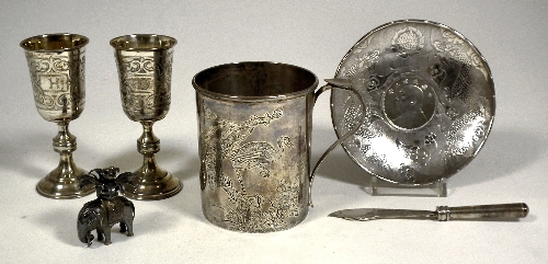 A Chinese silvery metal cylindrical