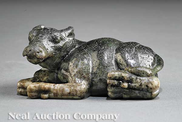 A Chinese Spinach Green Jade Figure