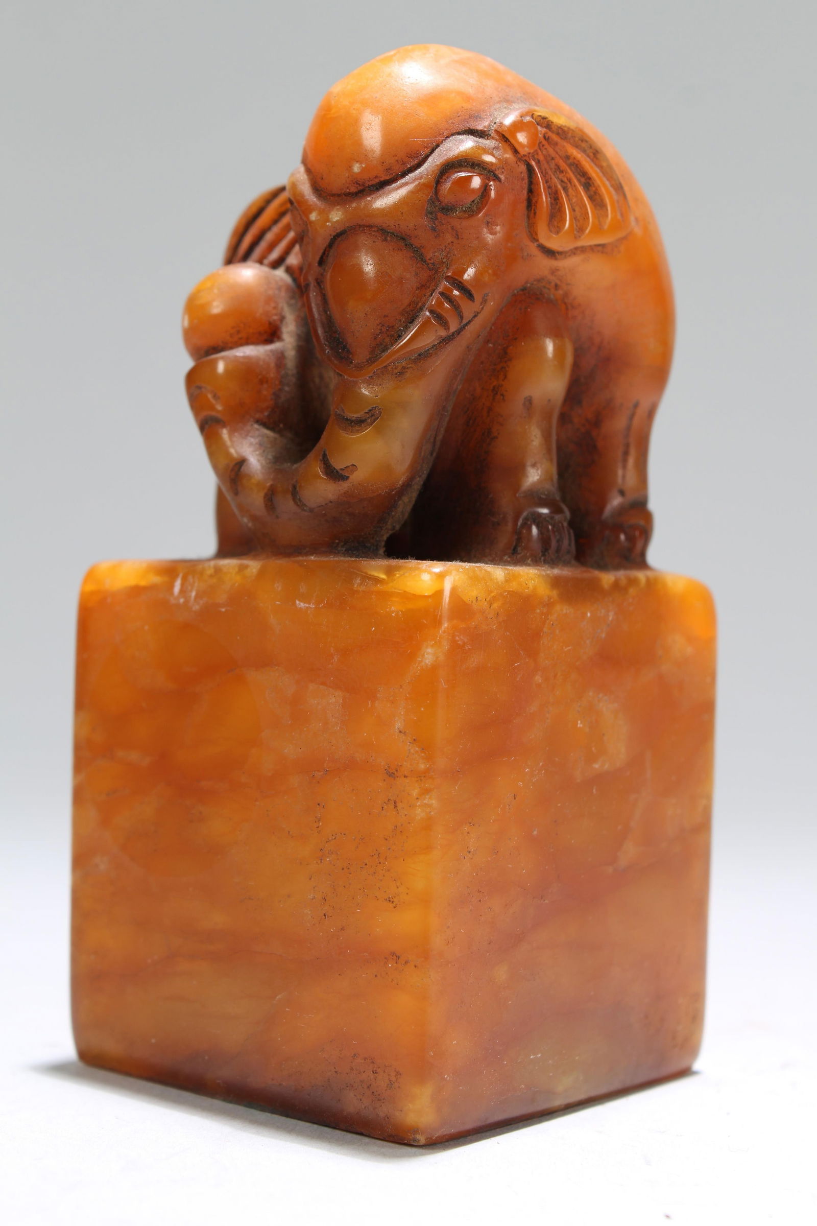 A CHINESE SQUARE-BASED SOAPSTONE