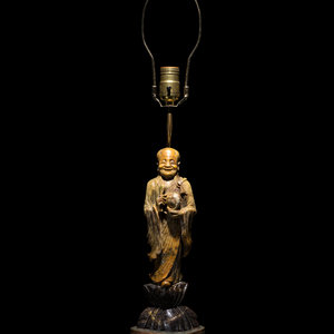 A Chinese Stone Lamp carved as an