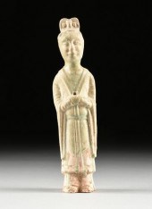 A CHINESE TOMB FIGURE OF A CIV