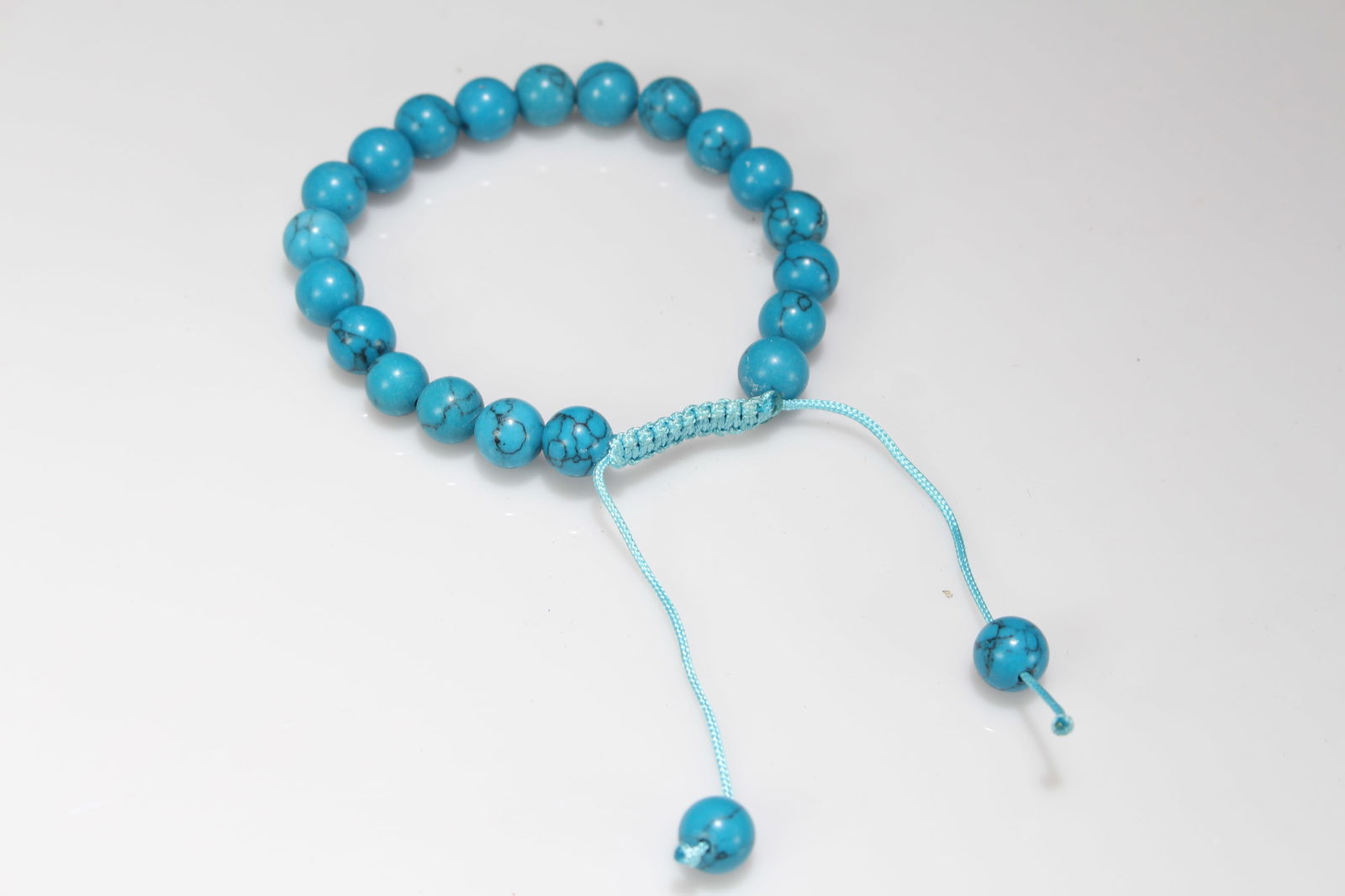 A CHINESE VIVIDLY-DETAILED BEADED