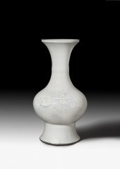 A Chinese white glazed and inc