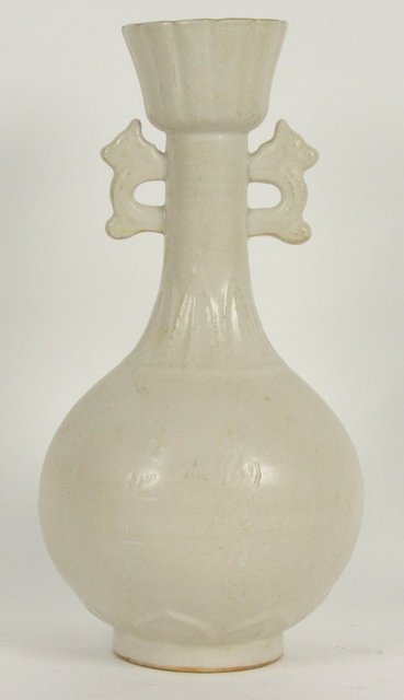 A Chinese white glazed bottle