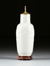 A CHINESE WHITE GLAZED ROULEAU