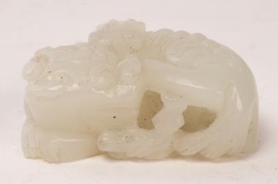 A Chinese white jade carved beast