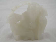 A Chinese white jade carving of a