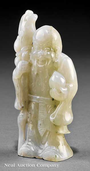 A Chinese White Jade Figure of