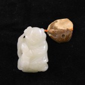 A Chinese white jade figure of