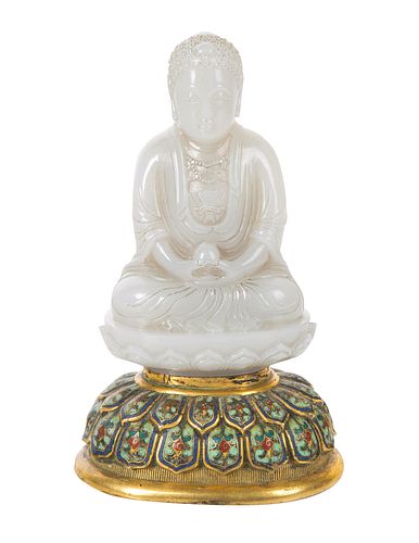 A CHINESE WHITE JADE FIGURE OF