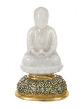 A CHINESE WHITE JADE FIGURE OF