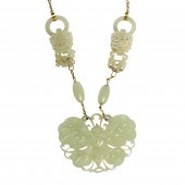 A CHINESE WHITE JADE NECKLACE