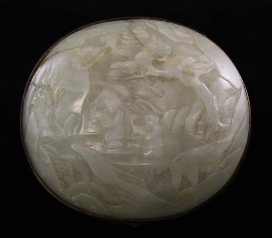 A Chinese white jade oval plaque