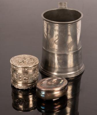 A Chinese white metal box and cover