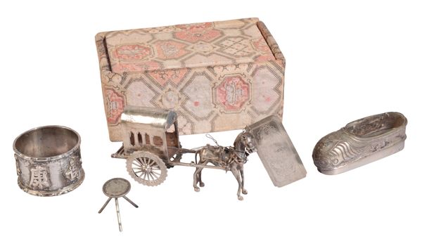 A CHINESE WHITE METAL MODEL OF A
