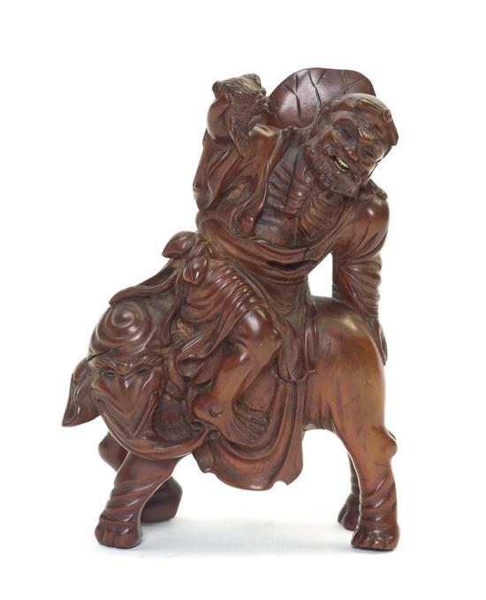A Chinese Wood Carving of an