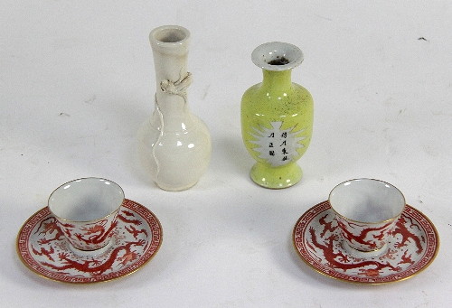 A Chinese yellow ground vase set
