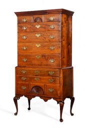 A CHIPPENDALE CHEST OF DRAWERS