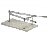 A CHROME AND MARBLE ROAST CARV