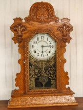 A CIRCA 1900 INGRAHAM OAK GING