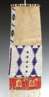 A CIRCA 1900 SIOUX BEADED TOBA