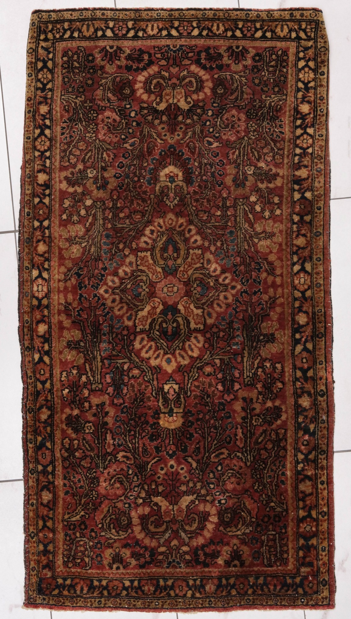 A CIRCA 1930S PERSIAN SAROUK HAND
