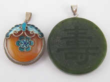 A circular hardstone pendant