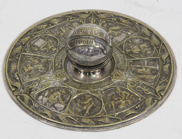 A circular inkstand and pen tray by