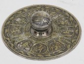 A circular inkstand and pen tr