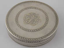 A circular Russian silver box
