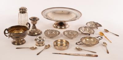 A circular silver fruit dish,