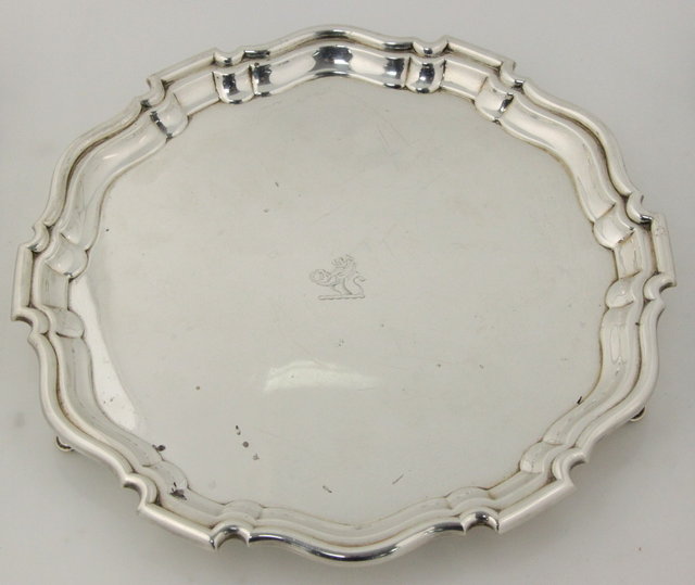 A circular silver salver
