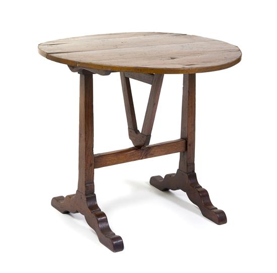 A Circular Tilt-Top Tea Table