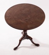 A circular tripod table, 64cm