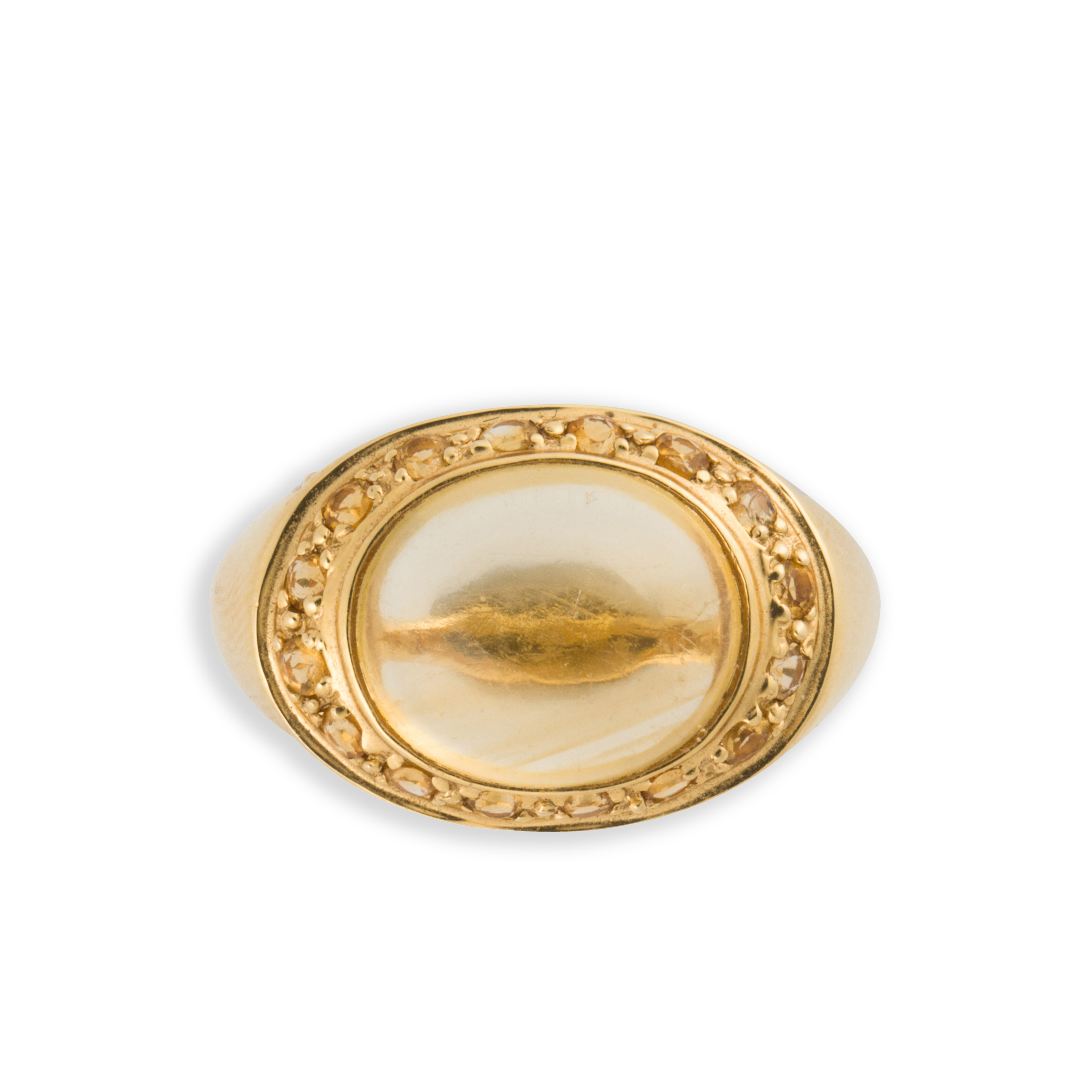 A CITRINE AND EIGHTEEN KARAT GOLD
