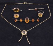 A citrine set dress ring and a