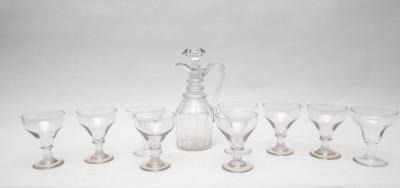 A claret jug and stopper with panel
