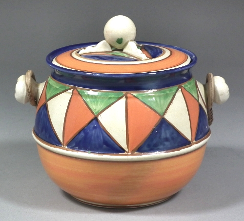 A Clarice Cliff pottery biscuit
