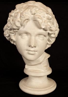 A classical plaster bust by D